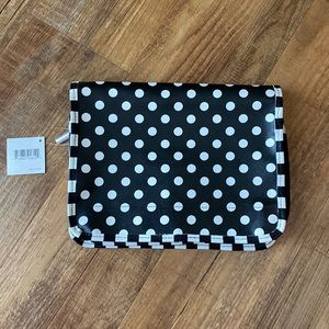 Macy’s black & white polka dot hanging cosmetic accessories bag.